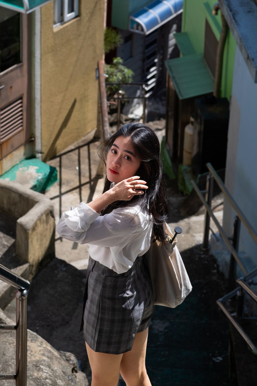 A girl looking back on the steps.
