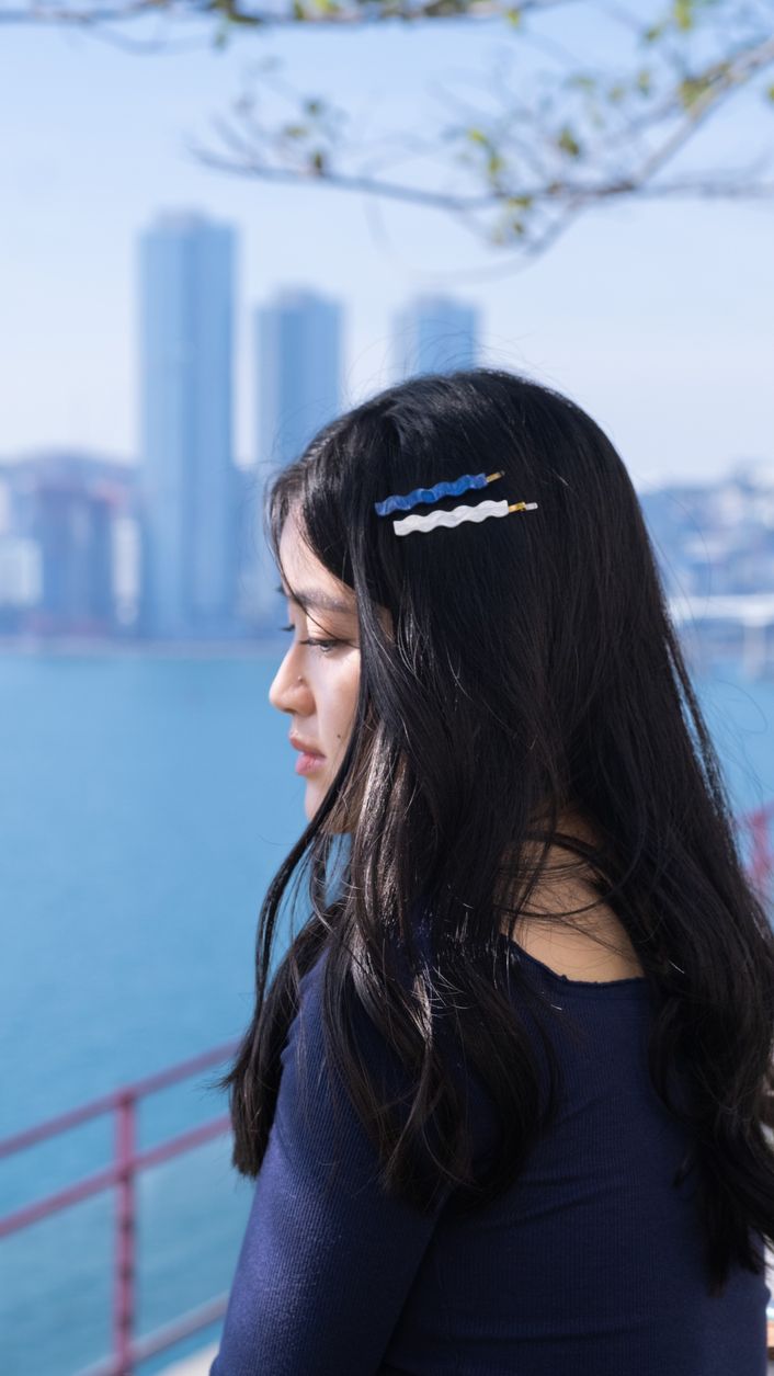 Wavy clips and the blue sea.